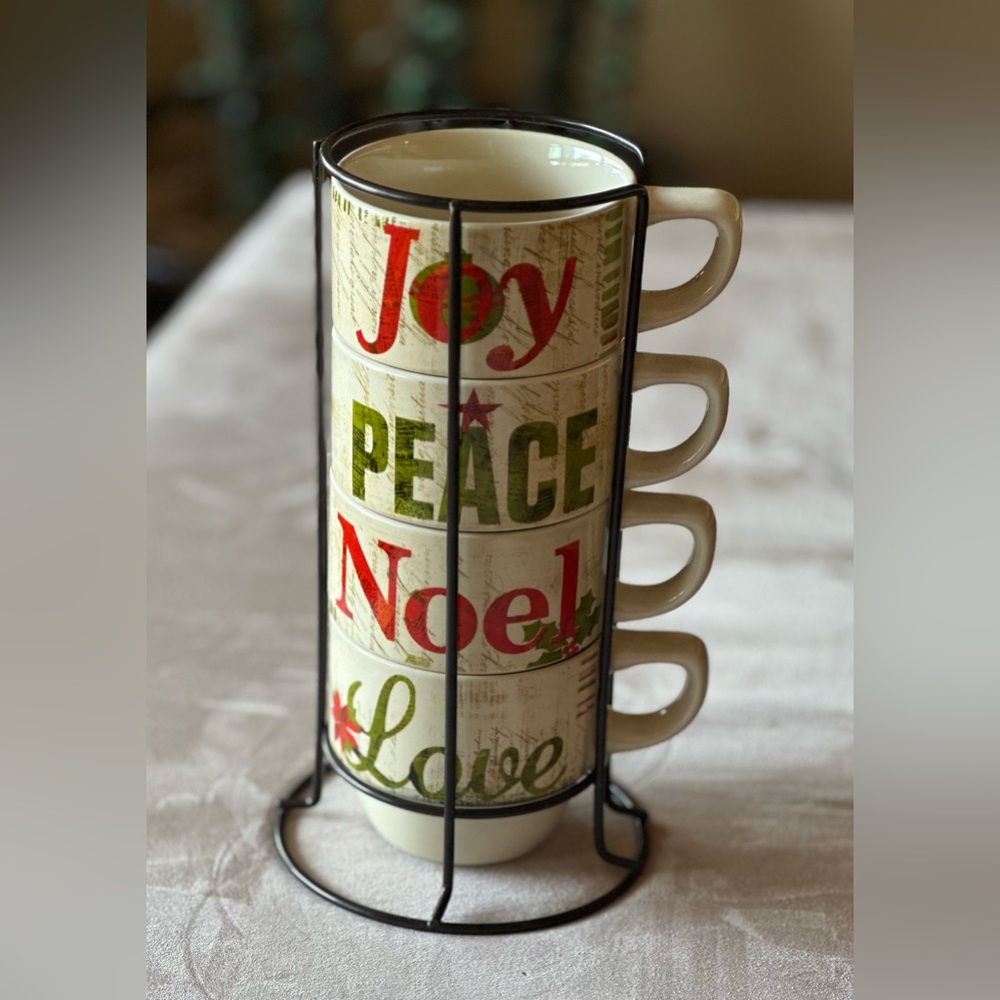 Pier 1 Imports Stacked Christmas Mugs. Joy Peace Noel Love. Includes rack.
